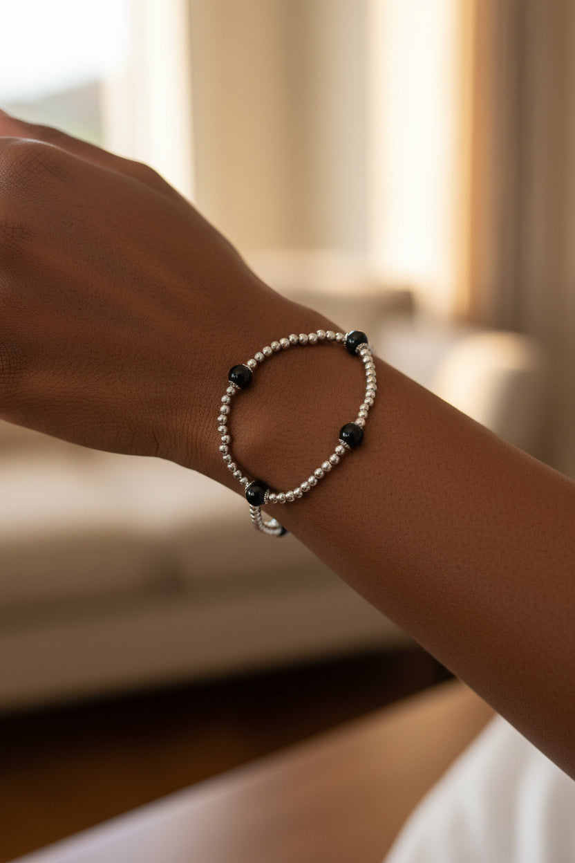 Silver Beaded Stretch Bracelet with Black Onyx Accent Beads